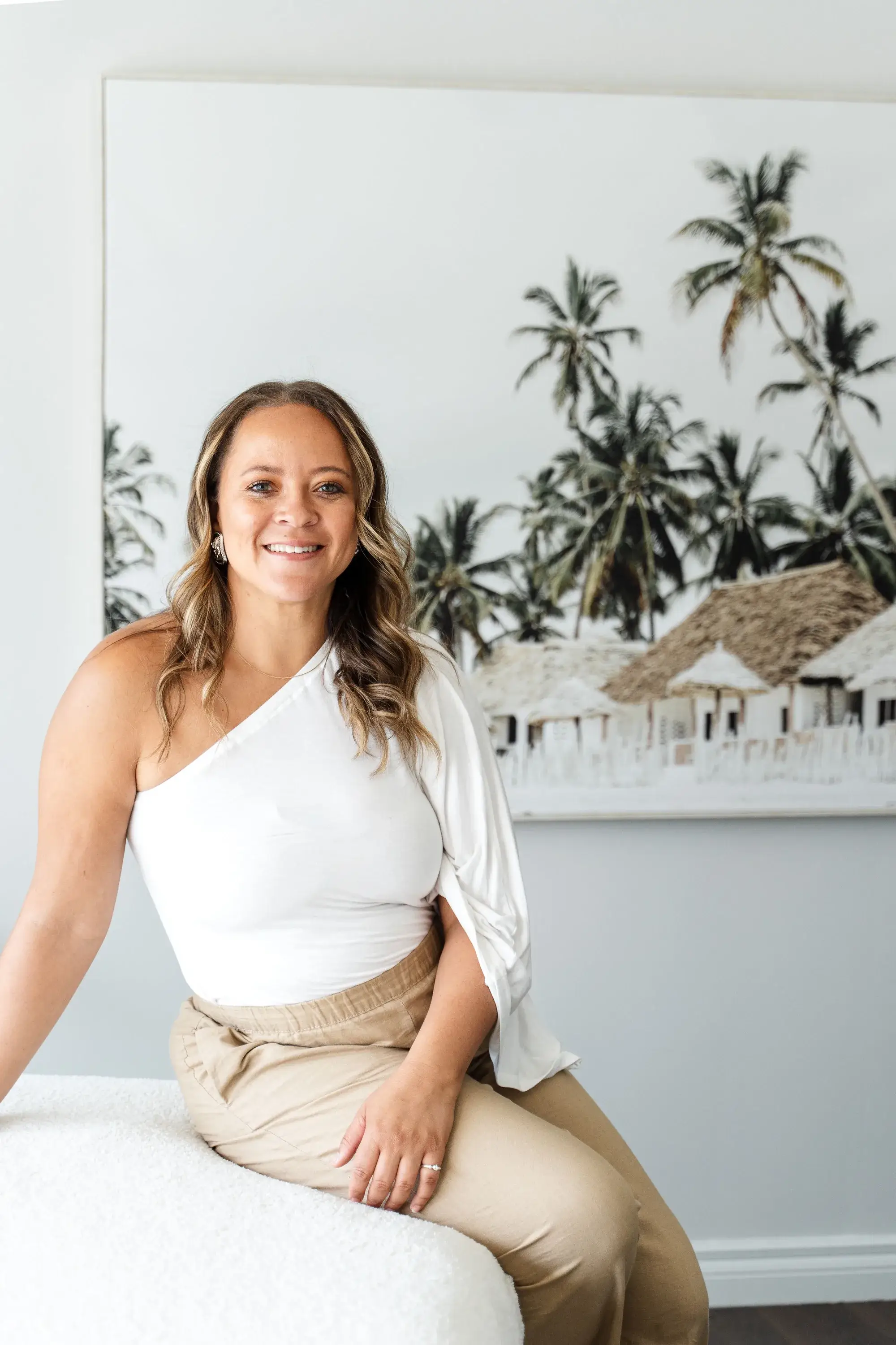 Meeghan Mackenzie, founder of Renu, seated in the clinic